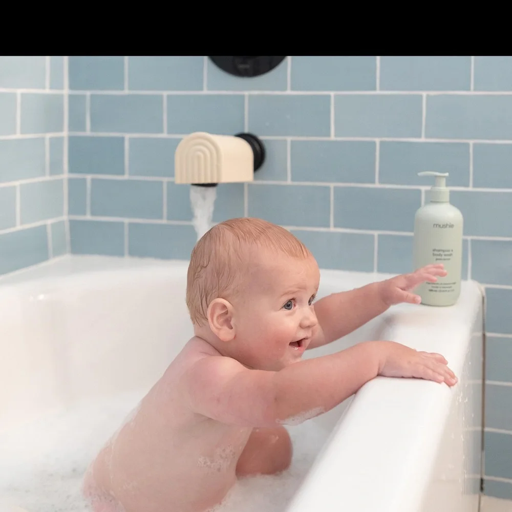 Mushie Bath Spout Cover Soft Silicone Faucet Safety Guard Cover Blush
